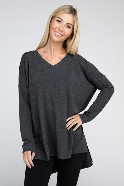 Dolman Top de manga larga con cuello en V y dobladillo alto y bajo con abertura lateral