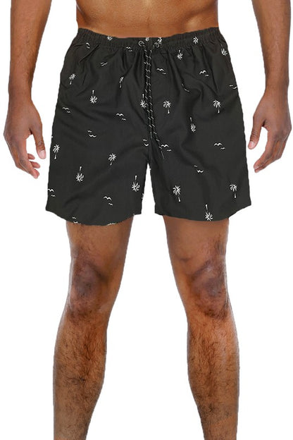 Shorts de baño con estampado de palmeras