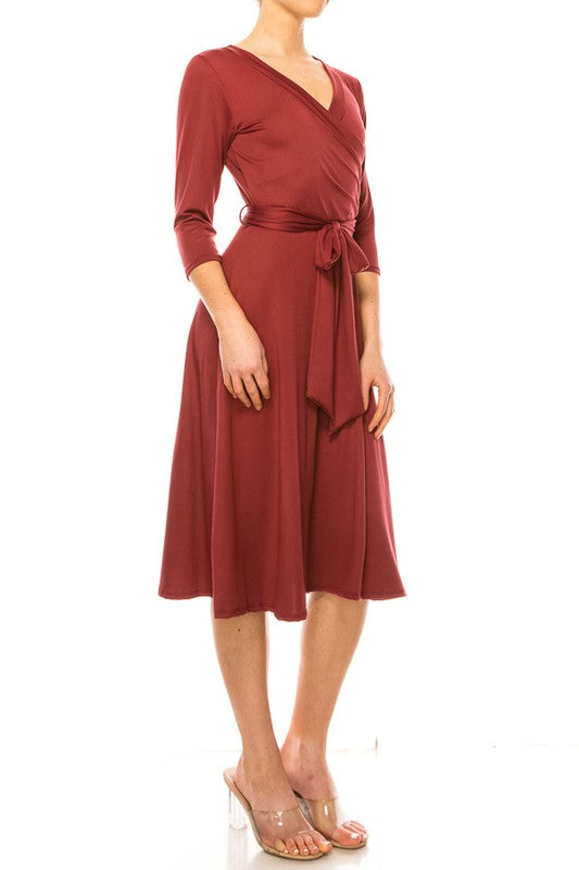 Solid faux wrap dress with deep V-neck