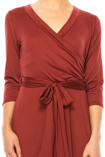 Solid faux wrap dress with deep V-neck