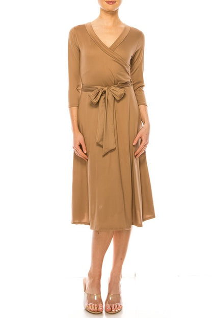 Solid faux wrap dress with deep V-neck