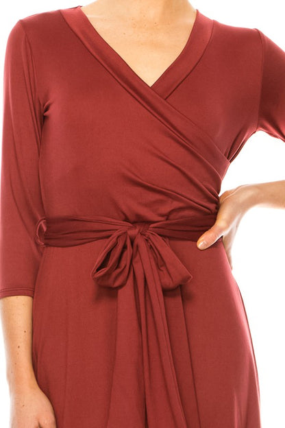 Solid faux wrap dress with deep V-neck