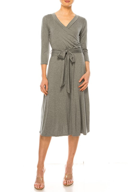 Solid faux wrap dress with deep V-neck