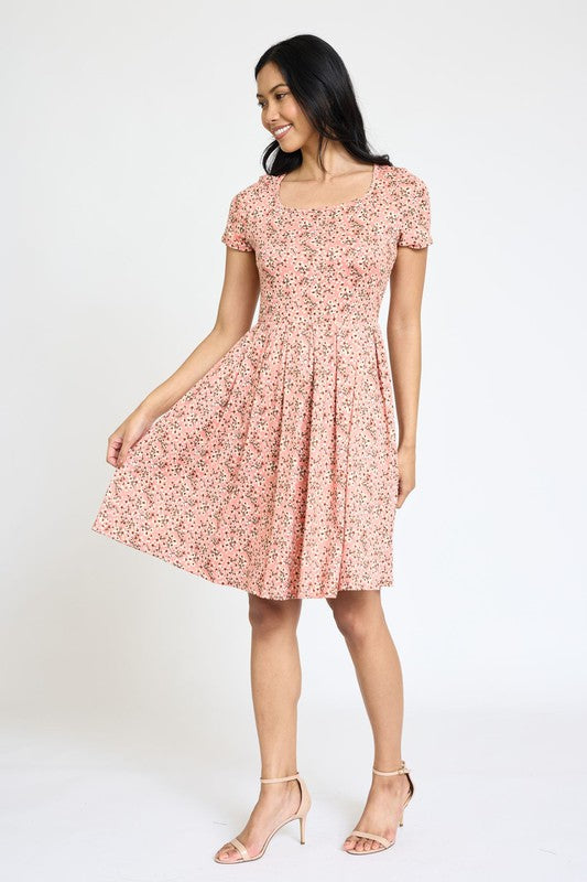 Vestido midi plisado de manga corta floral