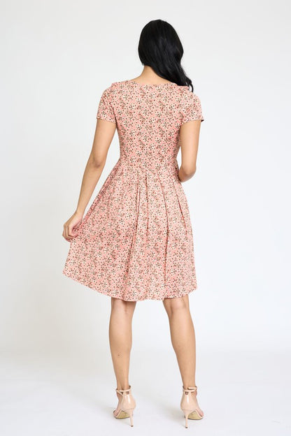 Vestido midi plisado de manga corta floral