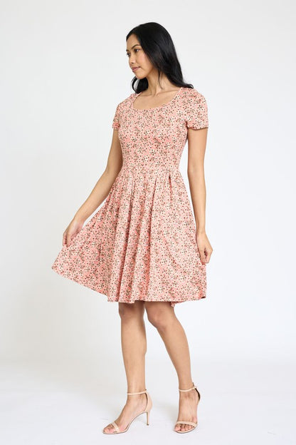 Vestido midi plisado de manga corta floral